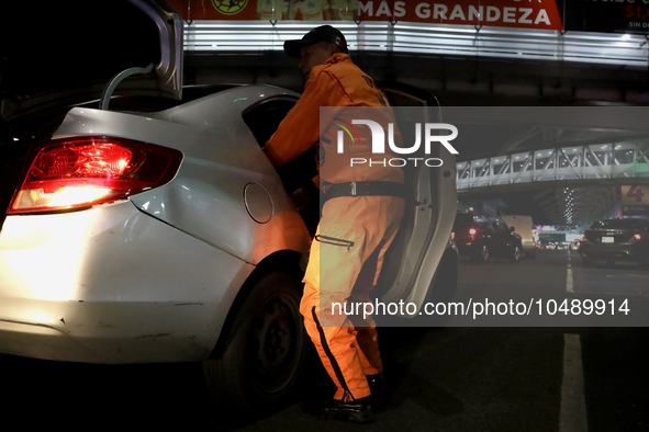 Hector Mendez, better known as El Chino, head and founder of the Azteca Topos International Rescue Brigade, arrives at the Mexico City Inter...