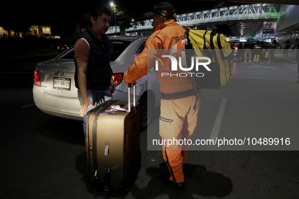 Hector Mendez, better known as El Chino, head and founder of the Azteca Topos International Rescue Brigade, arrives at the Mexico City Inter...