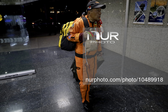 Hector Mendez, better known as El Chino, head and founder of the Azteca Topos International Rescue Brigade, arrives at the Mexico City Inter...