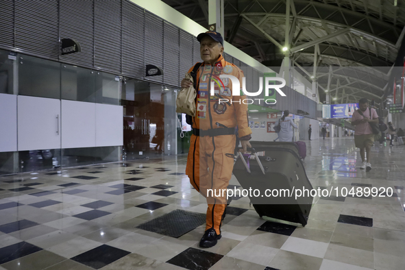 Hector Mendez, better known as El Chino, head and founder of the Azteca Topos International Rescue Brigade, arrives at the Mexico City Inter...