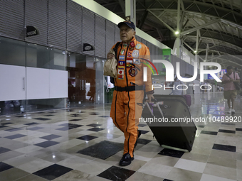 Hector Mendez, better known as El Chino, head and founder of the Azteca Topos International Rescue Brigade, arrives at the Mexico City Inter...