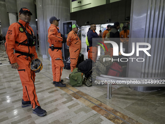 Topos Azteca International Rescue Brigade inside the Mexico City International Airport, before traveling to Morocco and helping in search an...