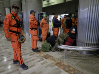 Topos Azteca International Rescue Brigade inside the Mexico City International Airport, before traveling to Morocco and helping in search an...