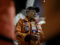 Hector Mendez, better known as El Chino, head and founder of the Azteca Topos International Rescue Brigade, talks with his work team inside...