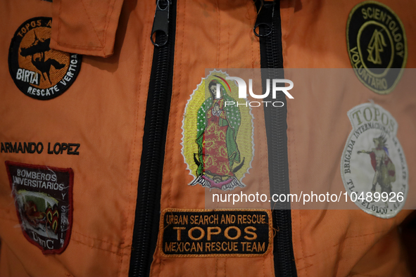 Shield of the Virgin of Guadalupe of the Azteca Topos International Rescue Brigade inside the Mexico City International Airport, before trav...