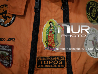 Shield of the Virgin of Guadalupe of the Azteca Topos International Rescue Brigade inside the Mexico City International Airport, before trav...