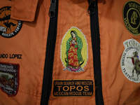 Shield of the Virgin of Guadalupe of the Azteca Topos International Rescue Brigade inside the Mexico City International Airport, before trav...