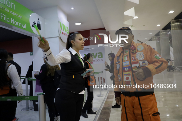 Hector Mendez, better known as El Chino, head and founder of the Azteca Topos International Rescue Brigade, arrives at the Mexico City Inter...