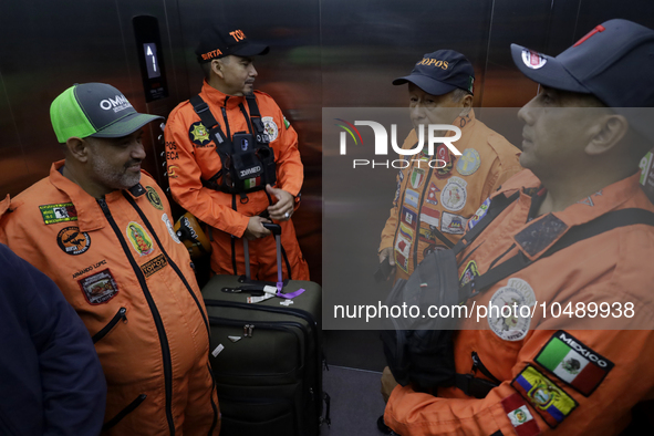 Topos Azteca International Rescue Brigade inside the Mexico City International Airport, before traveling to Morocco and helping in search an...