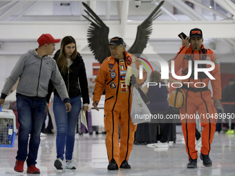 At the centre, Hector Mendez, better known as El Chino, head and founder of the Azteca Topos International Rescue Brigade, arrives at the Me...