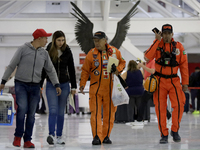 At the centre, Hector Mendez, better known as El Chino, head and founder of the Azteca Topos International Rescue Brigade, arrives at the Me...