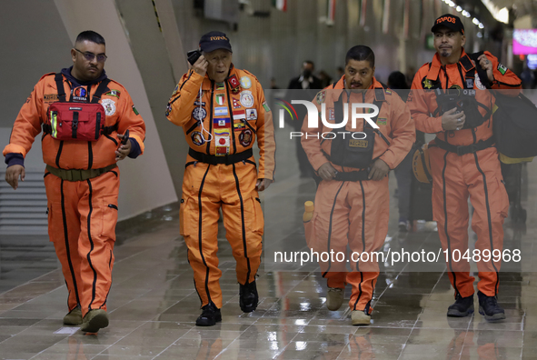 Topos Azteca International Rescue Brigade inside the Mexico City International Airport, before traveling to Morocco and helping in search an...