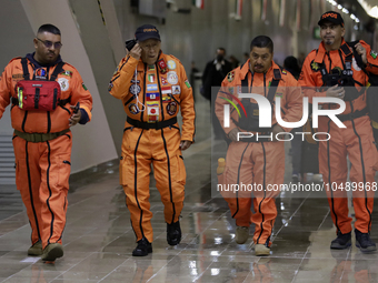 Topos Azteca International Rescue Brigade inside the Mexico City International Airport, before traveling to Morocco and helping in search an...