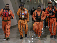 Topos Azteca International Rescue Brigade inside the Mexico City International Airport, before traveling to Morocco and helping in search an...