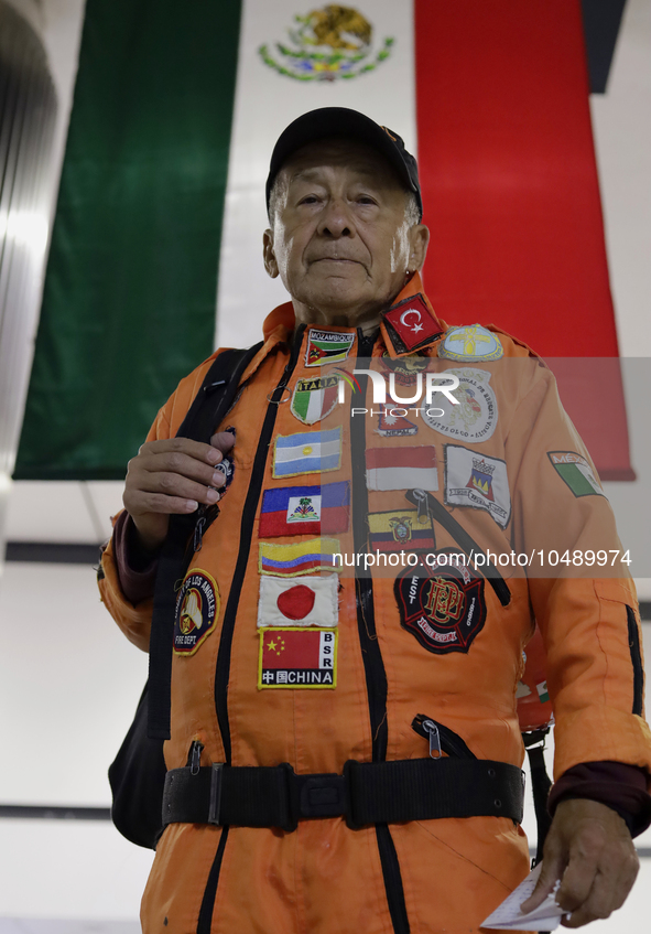 Hector Mendez, better known as El Chino, head and founder of the Azteca Topos International Rescue Brigade, arrives at the Mexico City Inter...