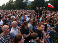 People attend a pre-election rally of Confederation Liberty and Independence party (Konfederacja) in Krakow, Polandon August 27, 2023. Polis...