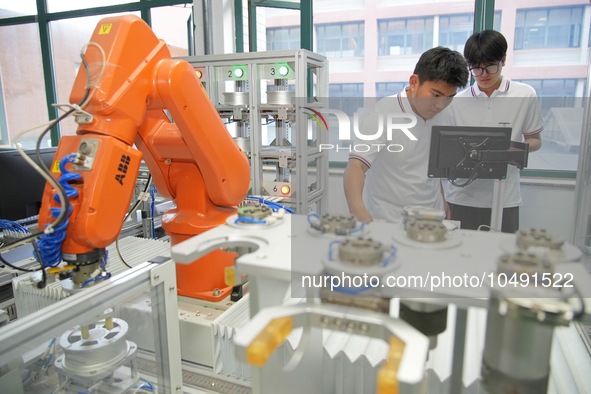 YANTAI, CHINA - SEPTEMBER 8, 2023 - Students conduct an industrial robot training at Yantai Cultural and Tourism Vocational College in Yanta...