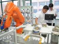 YANTAI, CHINA - SEPTEMBER 8, 2023 - Students conduct an industrial robot training at Yantai Cultural and Tourism Vocational College in Yanta...