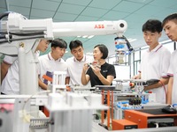 YANTAI, CHINA - SEPTEMBER 8, 2023 - Students conduct an industrial robot training at Yantai Cultural and Tourism Vocational College in Yanta...