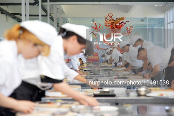 YANTAI, CHINA - SEPTEMBER 8, 2023 - Students have a cooking training at Yantai Vocational College of Culture and Tourism in East China's Sha...