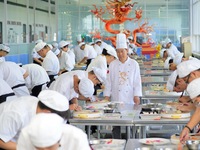 YANTAI, CHINA - SEPTEMBER 8, 2023 - Students have a cooking training at Yantai Vocational College of Culture and Tourism in East China's Sha...