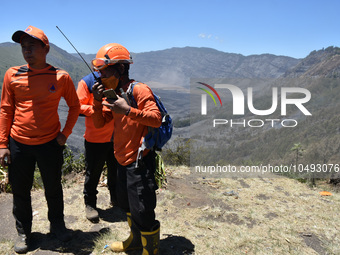 Some of  officer monitors hotspots on the slopes of a mountain that have been burning since mid-August during the dry season in the Bromo Te...