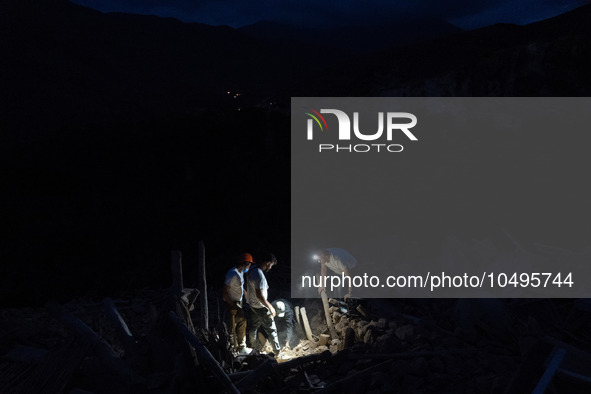 A foreign rescue team digs in search of survivors in the remote village of Imi N'Tala, located 75 kilometers southwest of Marrakesh. 