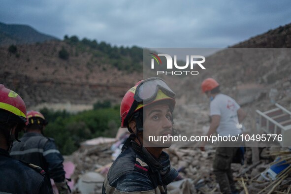 An exhausted member of the Moroccan civil protection, after digging in search of survivors in the remoted village of Imi N'Tala, located 75...