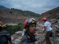 An exhausted member of the Moroccan civil protection, after digging in search of survivors in the remoted village of Imi N'Tala, located 75...