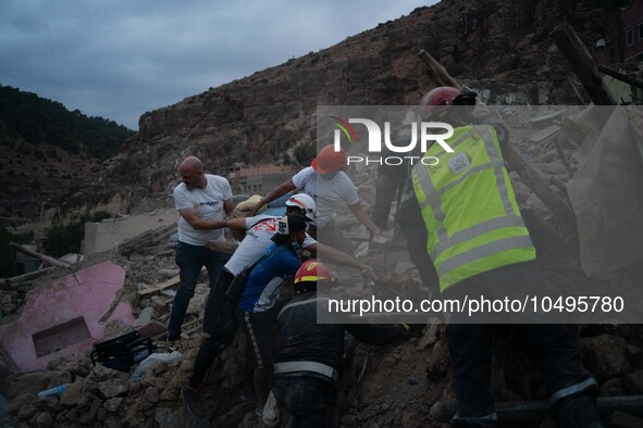 A foreign rescue team digs in search of survivors in the remote village of Imi N'Tala, located 75 kilometers southwest of Marrakesh. 