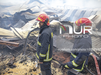 Firefighters stay  alart at Mohammadpur Krishi Market in Dhaka on September 14, 2023. A massive blaze has gutted shops in Dhaka's Mohammadpu...