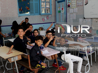 Children sit in a classroom as the 2023-2024 academic year begins for Tunisian students after the summer holiday in Tunis, Tunisia on Septem...