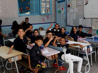 Children sit in a classroom as the 2023-2024 academic year begins for Tunisian students after the summer holiday in Tunis, Tunisia on Septem...