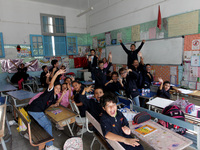 Children sit in a classroom as the 2023-2024 academic year begins for Tunisian students after the summer holiday in Tunis, Tunisia on Septem...