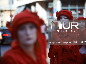 Red Rebels during the sit-in. Extinction Rebellion (XR) Toulouse organized a sit-in of women in one of the most frequented street of Toulous...