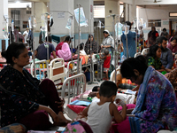 Patients suffering from dengue fever are being treated inside the Mugdha General Hospital's admission section in Dhaka, Bangladesh on Septem...