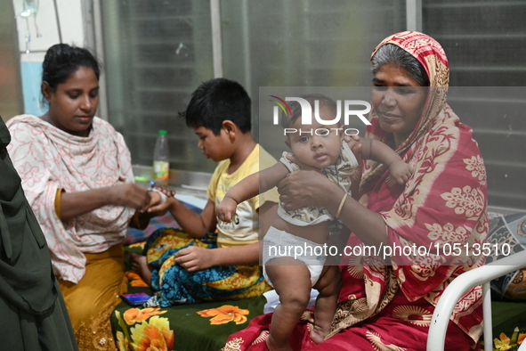 Patients suffering from dengue fever are being treated inside the Mugdha General Hospital's admission section in Dhaka, Bangladesh on Septem...