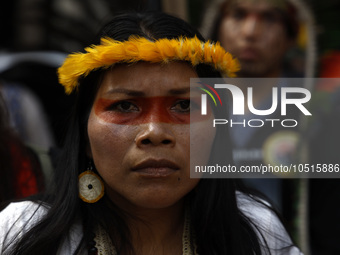 An indigenous person marches among thousands representing various groups participate in the ''End of Fossil Fuels'' protest across Midtown M...