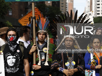 Indigenous people march among thousands representing various groups that participate in the ''End of Fossil Fuels'' protest across Midtown M...