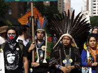 Indigenous people march among thousands representing various groups that participate in the ''End of Fossil Fuels'' protest across Midtown M...