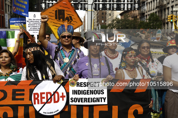 Indigenous people march among thousands representing various groups that participate in the ''End of Fossil Fuels'' protest across Midtown M...