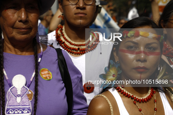 Indigenous people march among thousands representing various groups that participate in the ''End of Fossil Fuels'' protest across Midtown M...