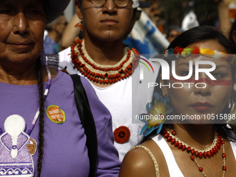 Indigenous people march among thousands representing various groups that participate in the ''End of Fossil Fuels'' protest across Midtown M...