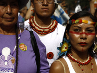 Indigenous people march among thousands representing various groups that participate in the ''End of Fossil Fuels'' protest across Midtown M...