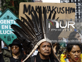 Indigenous people march among thousands representing various groups that participate in the ''End of Fossil Fuels'' protest across Midtown M...