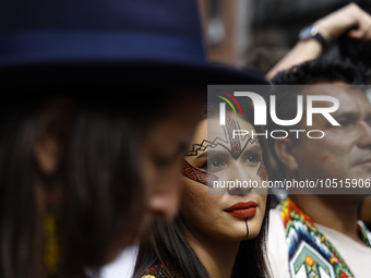 Indigenous people march among thousands representing various groups that participate in the ''End of Fossil Fuels'' protest across Midtown M...