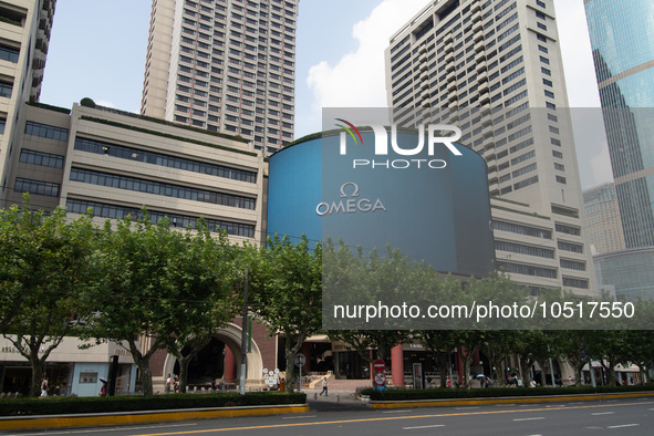 SHANGHAI, CHINA - SEPTEMBER 18, 2023 - An advertisement for OMEGA watches is seen on the wall of the mall in Shanghai, China, September 18,...