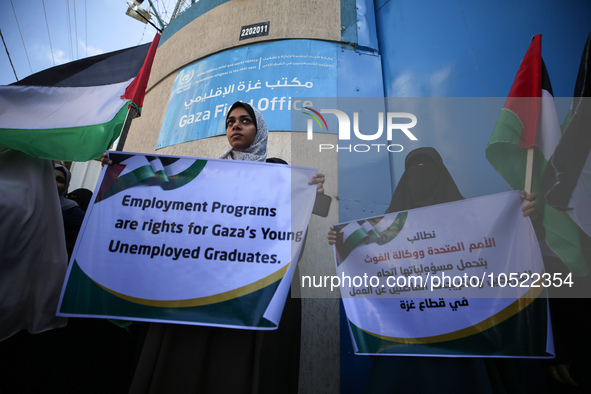 Demonstrators gather outside the Gaza Field Office for the United Nations Relief Works Agency for Palestine Refugees in the Near East (UNRWA...