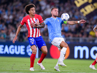 Axel Witsel of Atletico de Madrid and Ciro Immobile of SS Lazio compete for the ball during the UEFA Champions League Group E match between...