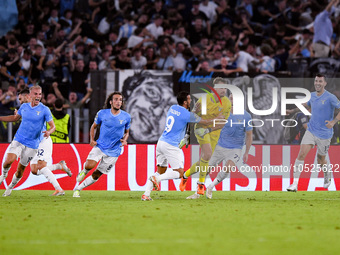 Ivan Provedel goalkeeper of SS Lazio celebrates scoring his side first goal during the UEFA Champions League Group E match between SS Lazio...